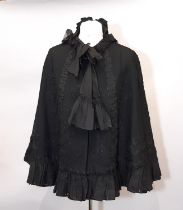 Victorian shoulder cape circa 1890's by John Satterfield & Co of Manchester; cape is of fine black