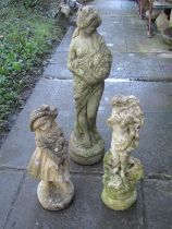 Three weathered cast composition stone garden ornaments, two maidens of varying design, the