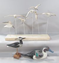 Folk art style decorative arts it include a model group of six flying Terns supported by thin