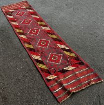 Meshwani Runner with repeating red and blue diamond pattern with hints of mint green, 241cm x 62cm