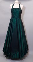 Circa 1958 shot taffeta ball gown with halter neck, stayed bodice and full circular skirt, with