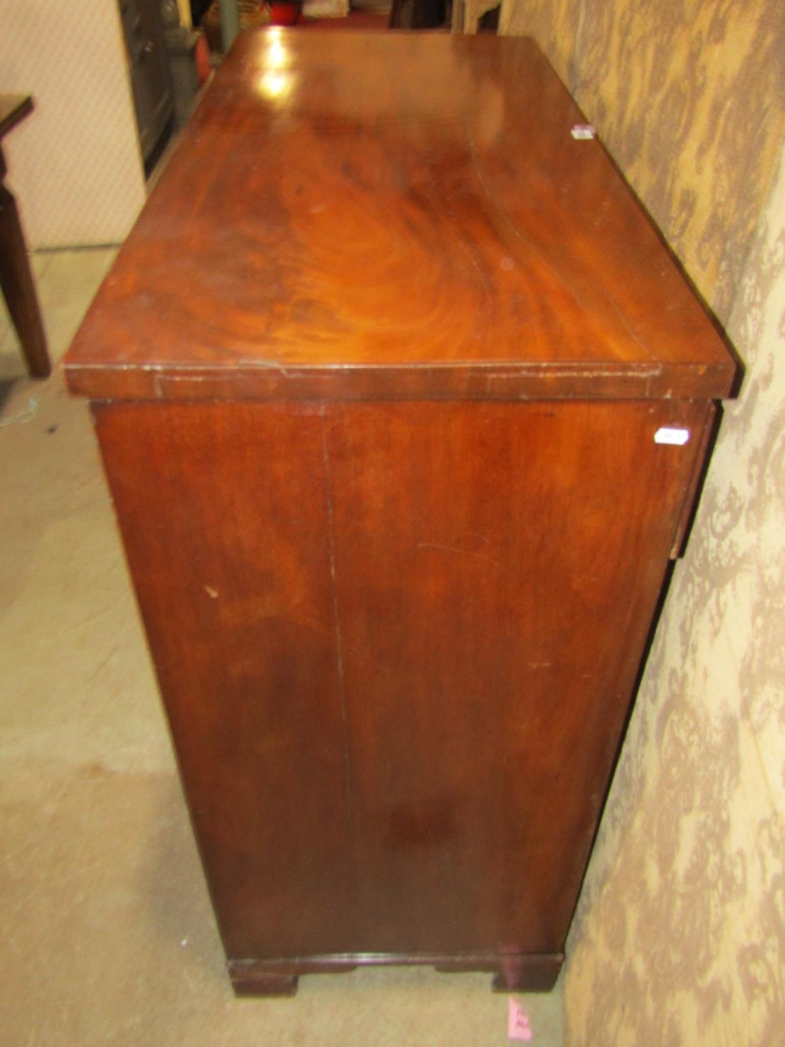 A Georgian mahogany bedroom chest of two short over three long graduated drawers set on bracket - Image 4 of 5