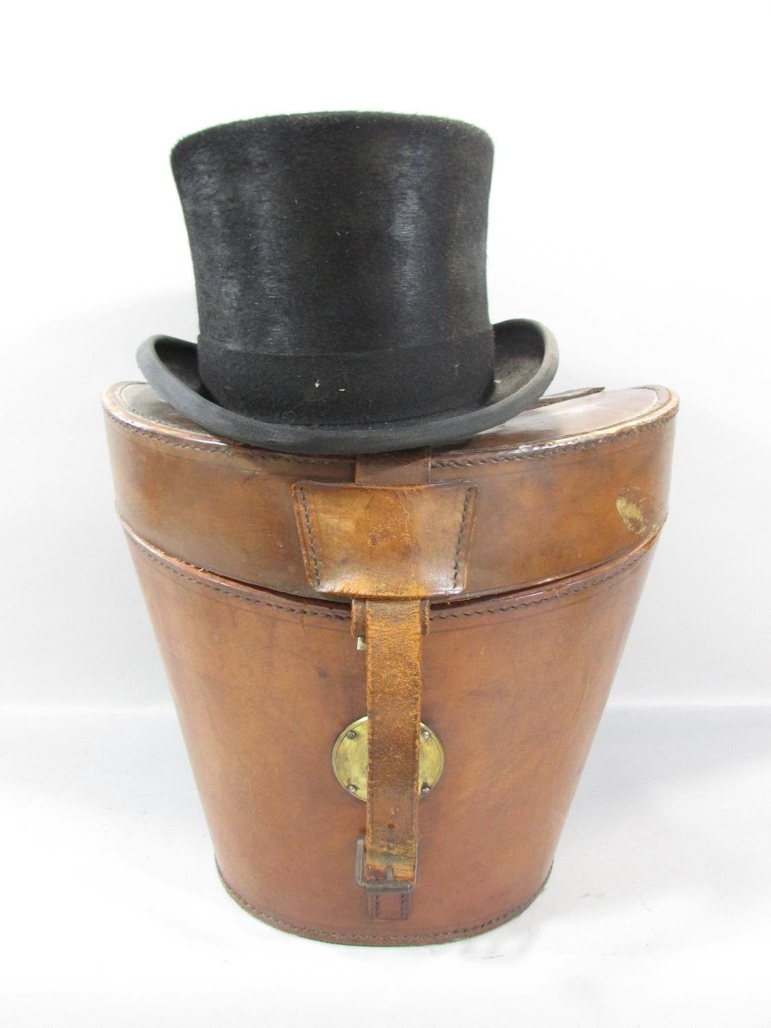 A vintage leather top hat box containing a modern 100% fine fur felt hat size UK 7 1/8 US 7 1/4