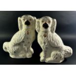 A large pair of Staffordshire dogs with gilt detail, 40cm high approx