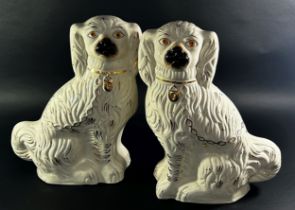 A large pair of Staffordshire dogs with gilt detail, 40cm high approx