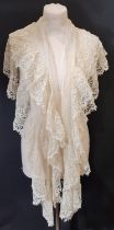An Edwardian fichu with double layered cream lace edging on net with lace insets, length approx 2m