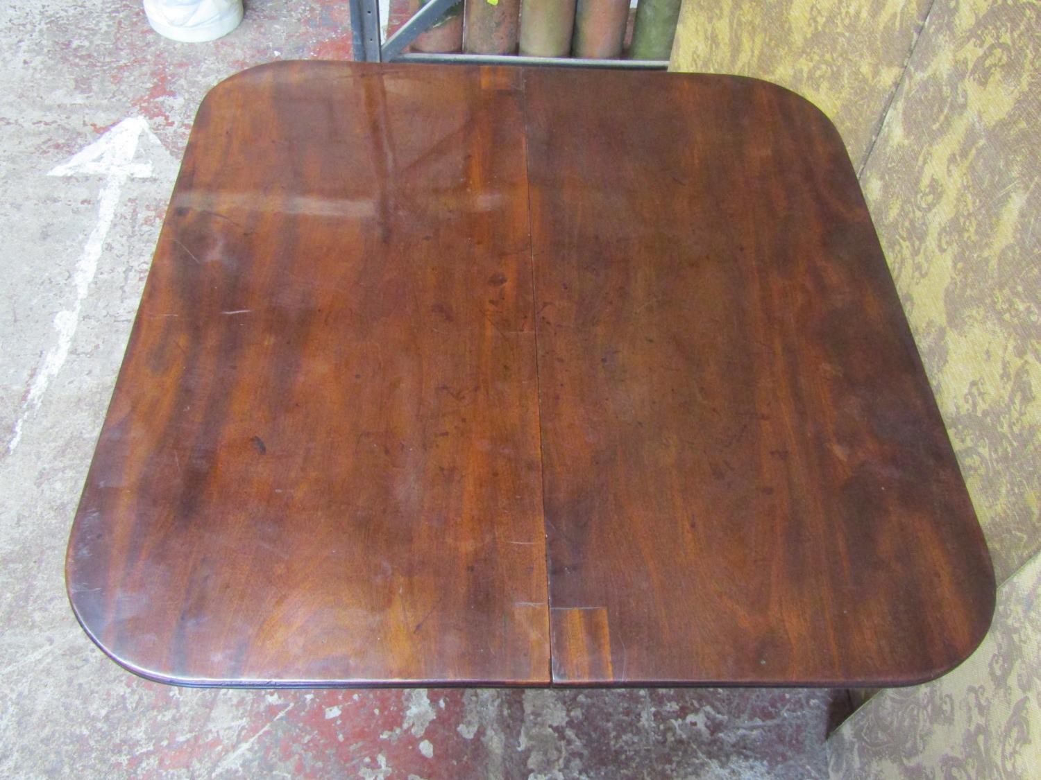 A Regency mahogany D end tea table the swivel top raised on a cylindrical spiral column stem and - Image 5 of 7