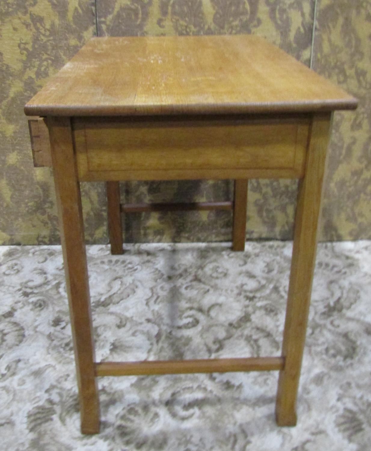 An Arts & Crafts oak side table with shallow frieze drawer raised on square cut and moulded - Image 6 of 7