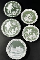 Five small green Wedgewood style plates