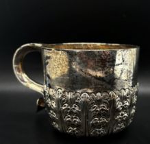 A heavily engraved floral silver christening cup, London 1895, makers mark Mappin & Webb, 8 cm