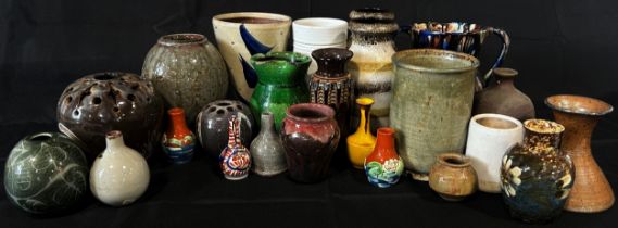 A mixed collection of studio pottery vases/urns to include Cornish Studios, other with monogrammed