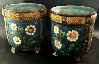 A pair of large Victorian Wedgwood majolica Argentaware jardinières on acanthus moulded supports