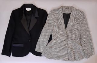 A classic black lady's jacket by Yves Saint Laurent with satin collar and covered button, size