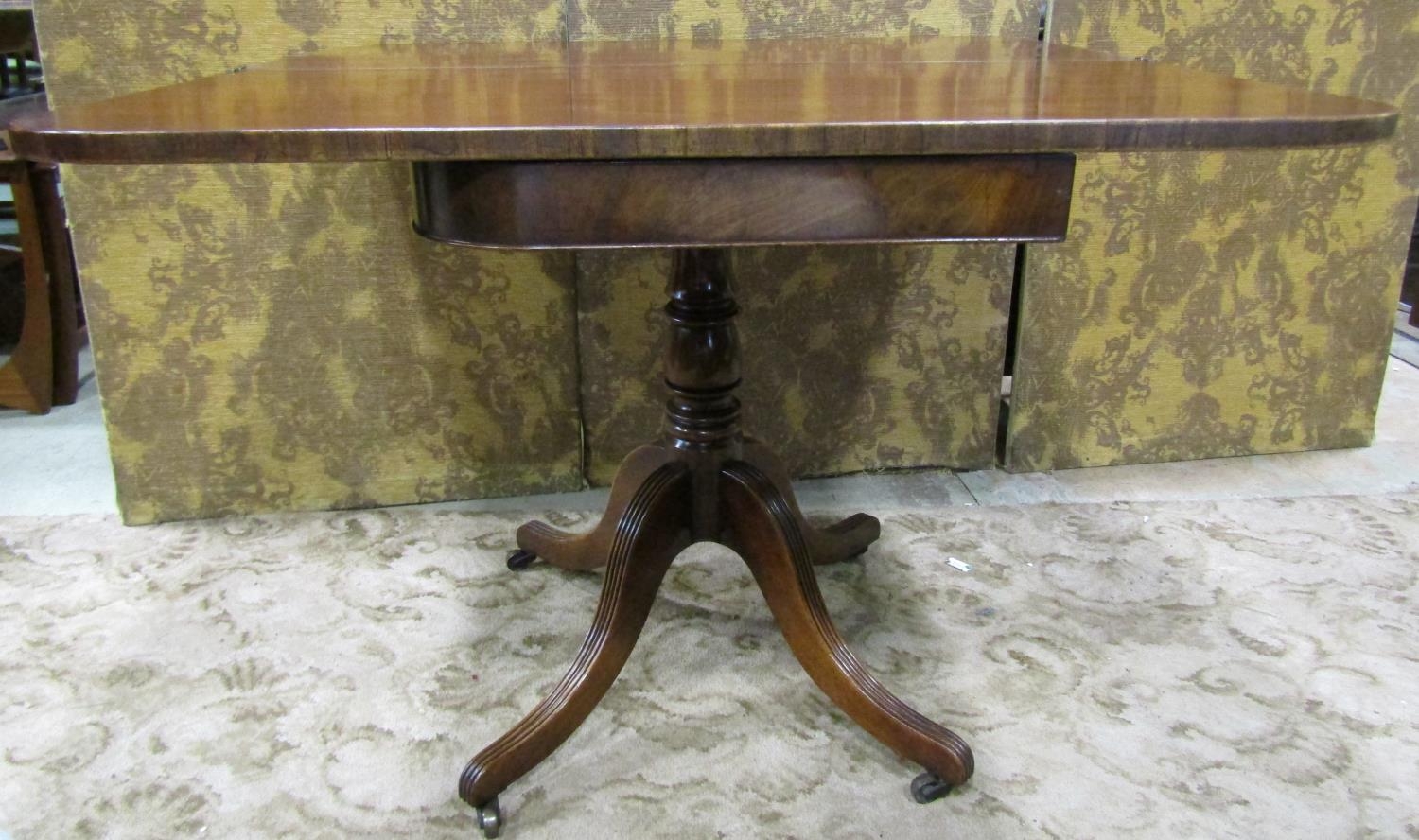 An early 19th century mahogany fold over top tea table of rectangular form with rounded corners, - Image 2 of 4