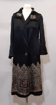 1920's black silk coat with screen printed pattern to collar, cuffs, belt and lower hem, with