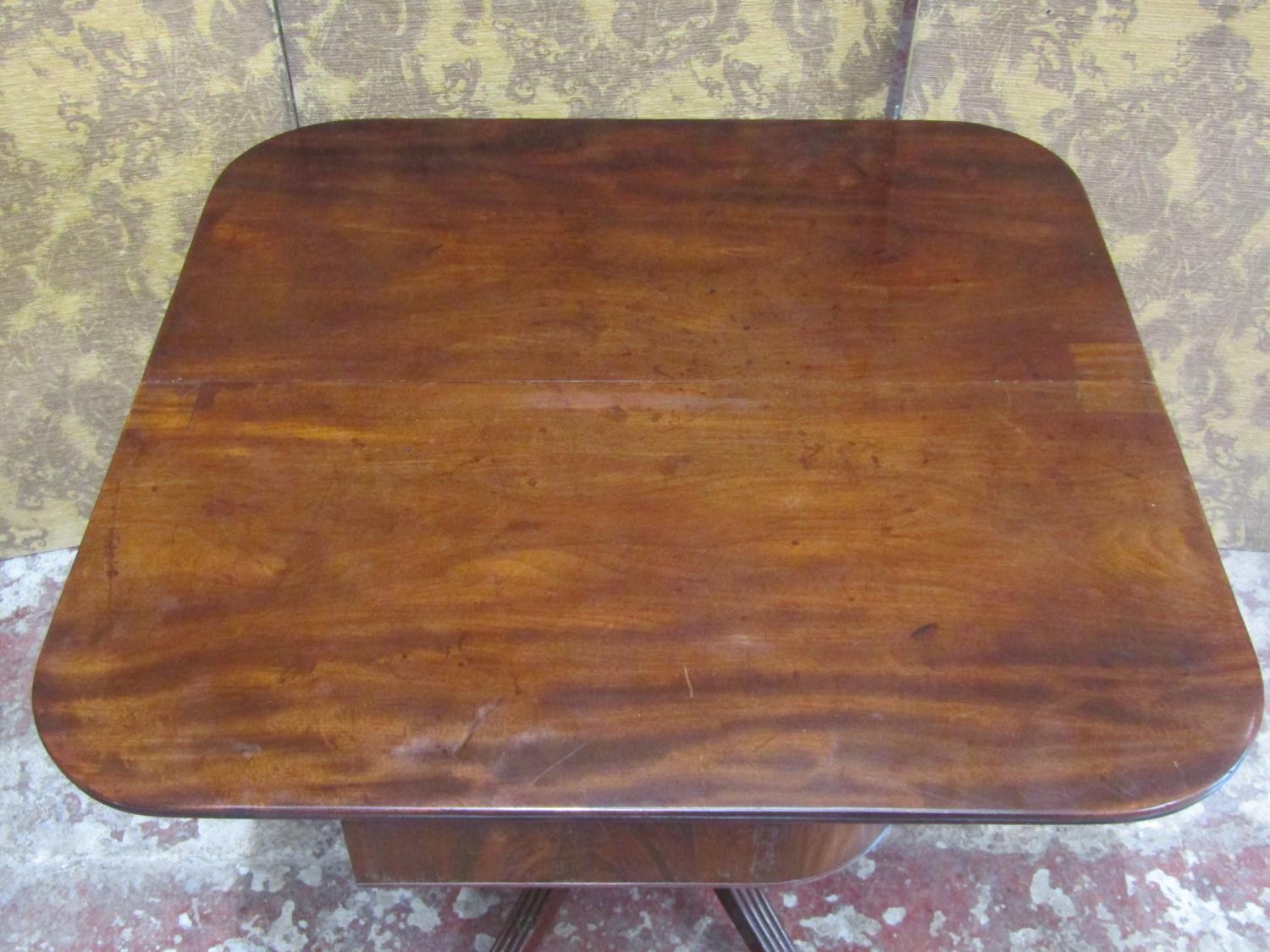 A Regency mahogany D end tea table the swivel top raised on a cylindrical spiral column stem and - Image 4 of 7