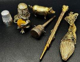 A collection of bijouterie / jewellery items to include scent bottles, pin cushion, carnelian beads,