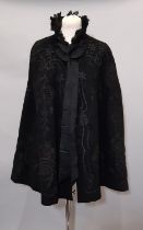 Late 19th century Victorian shoulder cape in black wool heavily embellished with applied silk