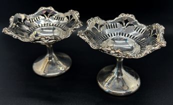 A pair of silver bonbon dishes, with a floral design in original retail box from Alexandria, Chester