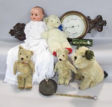 A miscellaneous collection of items including an early 20th century bisque head doll, three