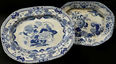 Two large blue and white plates with foliate detail, together with a further ironstone meat