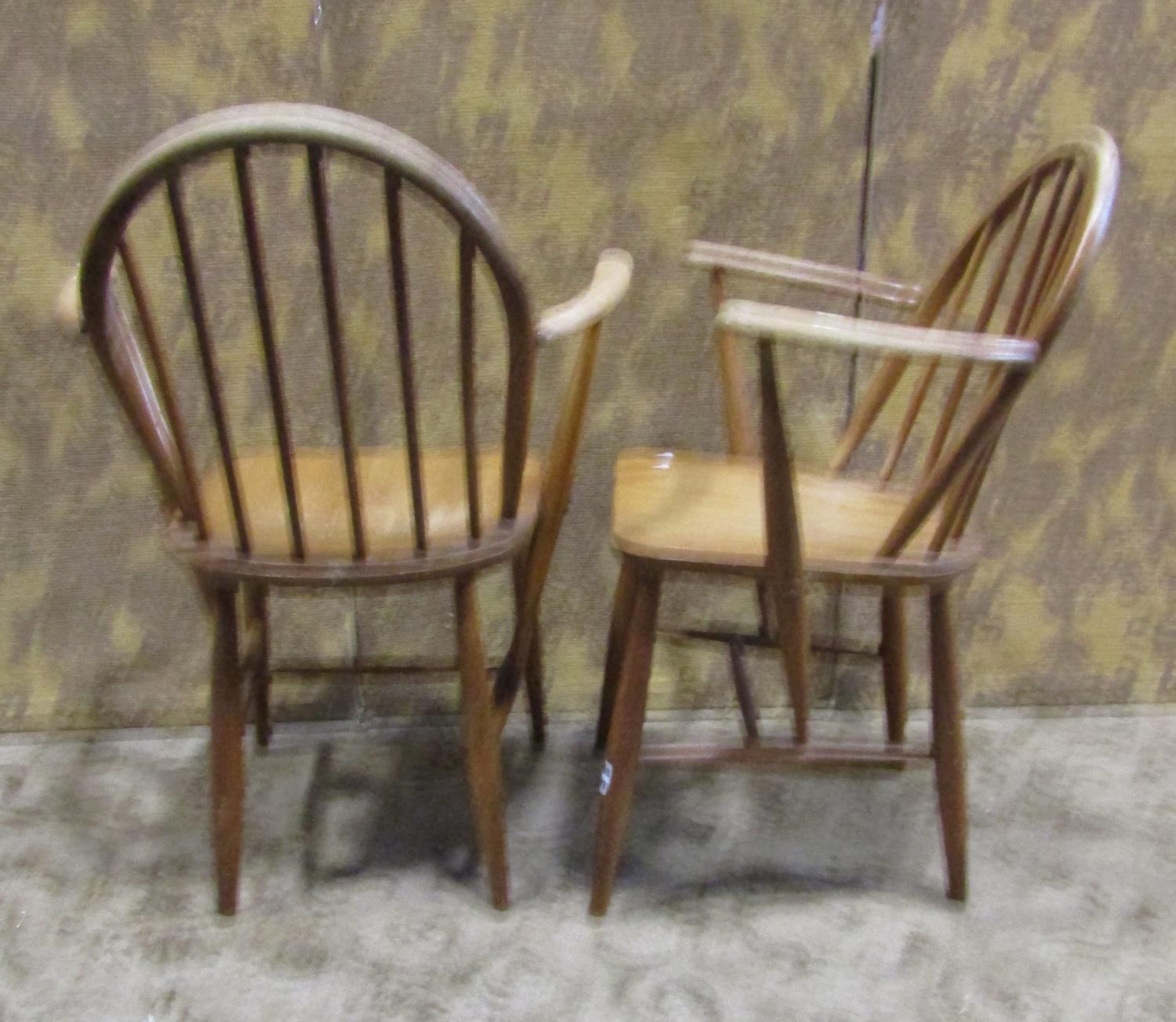 A Pair of vintage Ercol elm and beechwood stick back elbow chairs - Image 4 of 6