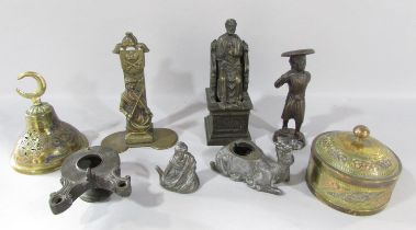 A miscellaneous collection of small bronze and spelter statues, including St Peter, a camel, a