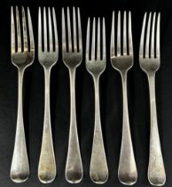 A silver group of table and dessert forks, Sheffield with mixed hallmarks, 12 altogether, 21 ozs