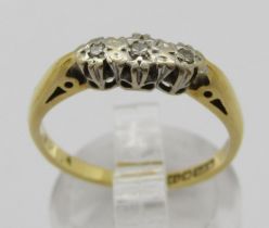 18ct three stone diamond ring, size N/O, 2.9g
