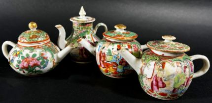 Four miniature Cantonese tea and coffee pots with traditional painted finish, 7.5cm max