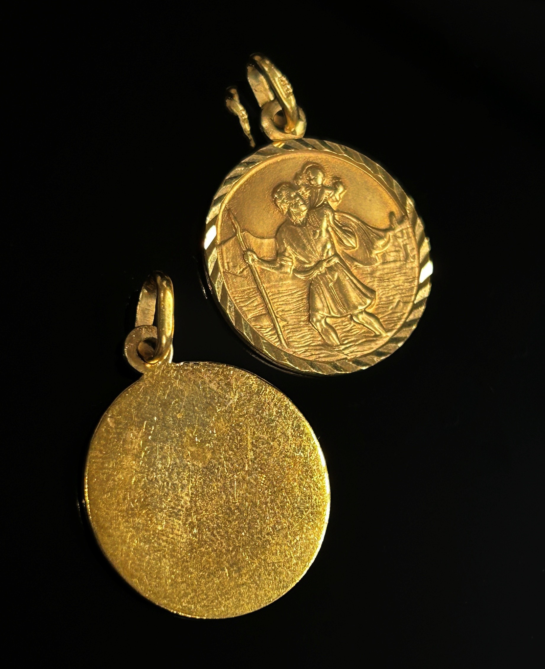 Three 9ct pendants; two St Christopher examples and a locket with engraved decoration, 9.4g total ( - Image 3 of 5