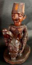 Attributed to the Fakeye group, a large Yoruba / Nigerian carved hardwood figure group, in the