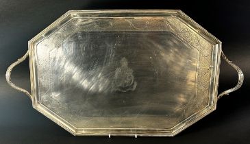 A silver serving tray with side engravings and centre inscriptions reading 'Labore', London, dated