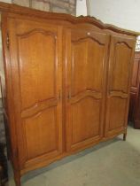 An oak triple wardrobe the framework of knockdown form, 2m long