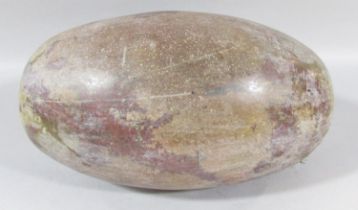 An Indian natural stone Shiva Lingam 25cm wide.