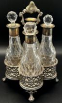 A Victorian four-piece cruet set, London 1851, maker Samuel Whitford, one lacking a glass stopper, 9