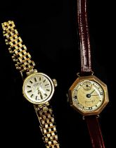 A lady’s 9ct yellow gold cased wristwatch and another 9ct yellow gold cased example by Accurist.