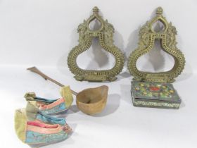 A pair of Chinese Ceremonial Brass Stirrups, two pairs of miniature silk Chinese shoes, a wooden