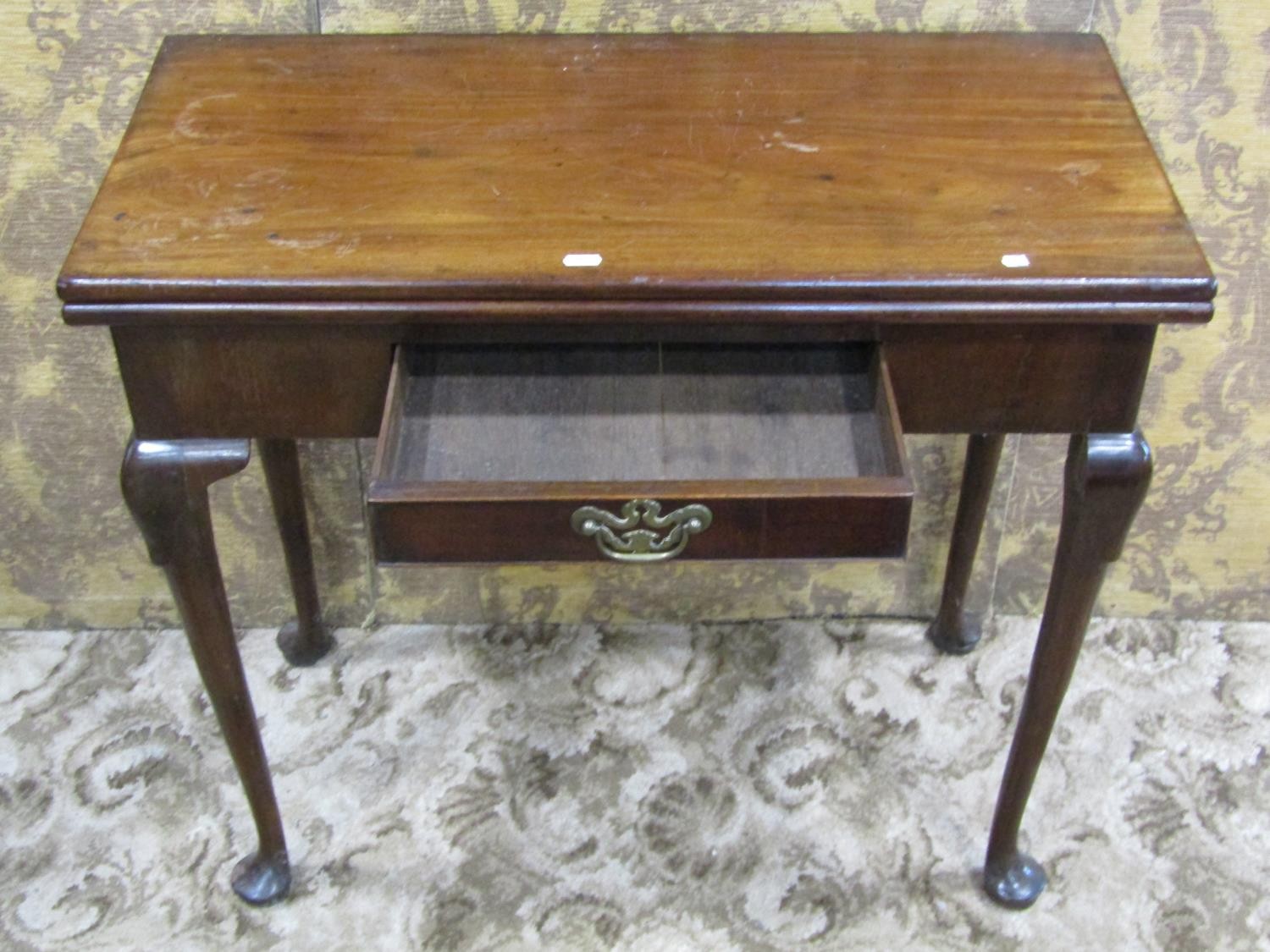 A Georgian mahogany rectangular fold over top tea table with central frieze drawer raised on - Image 2 of 4