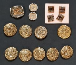 Eight Bimini type 1940's/50's glass buttons, 5 having torch mark back stamp and 'Made in England',