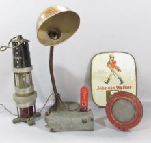 A vintage flexi desk lamp, a miner’s Spiralarm gas warning device, a Jonnie Walker Whisky