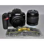 A Nikon D3500 18-55 VR Kit Camera, as new in it’s original box and instruction manual.