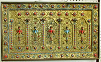 A Nepalese gilt-metal Buddhist panel, c.19th century decorated with standing Buddhist motifs,