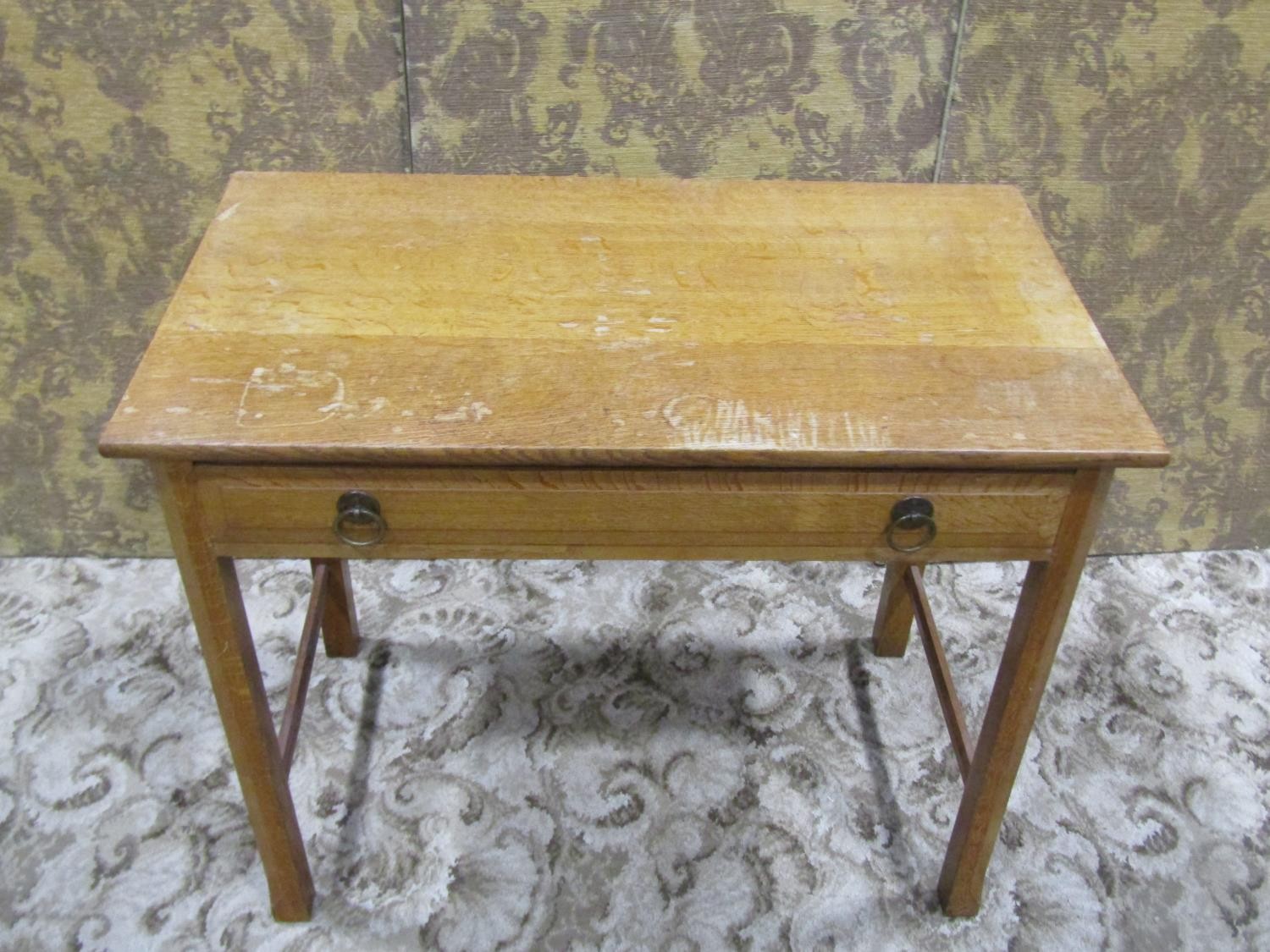An Arts & Crafts oak side table with shallow frieze drawer raised on square cut and moulded - Image 2 of 7