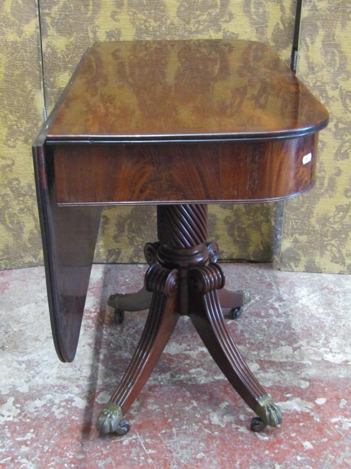 A Regency mahogany D end tea table the swivel top raised on a cylindrical spiral column stem and - Image 2 of 7