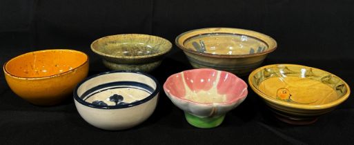 A collection of studio pottery bowls to include a small Japanese dish by Mashiko, example by St