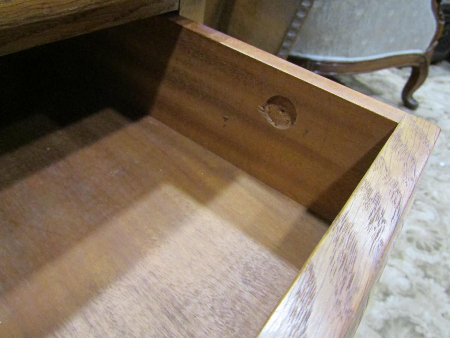 An Arts & Crafts oak side table with shallow frieze drawer raised on square cut and moulded - Image 7 of 7