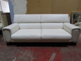 A white leather Natuzzi Italia three piece suite with chrome frames, in almost used condition