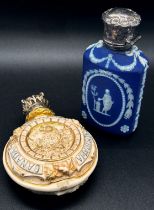 A Victorian commemorative scent bottle, the circular ceramic body by Royal Worcester depicting a