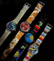 Twelve assorted boxed Swatch Watches to include a Pop range ‘Putti’ example designed by Vivien